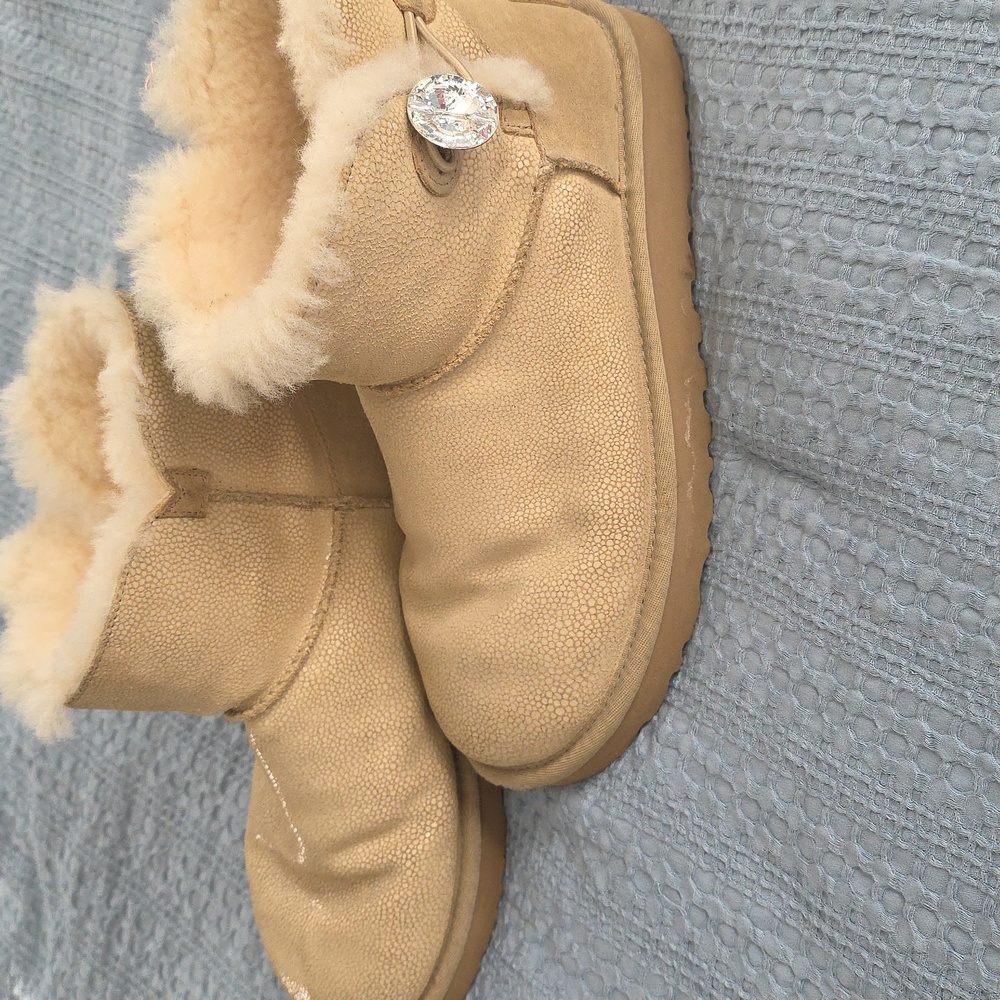 UGG Tan Shearling Boots with Sequin Logo